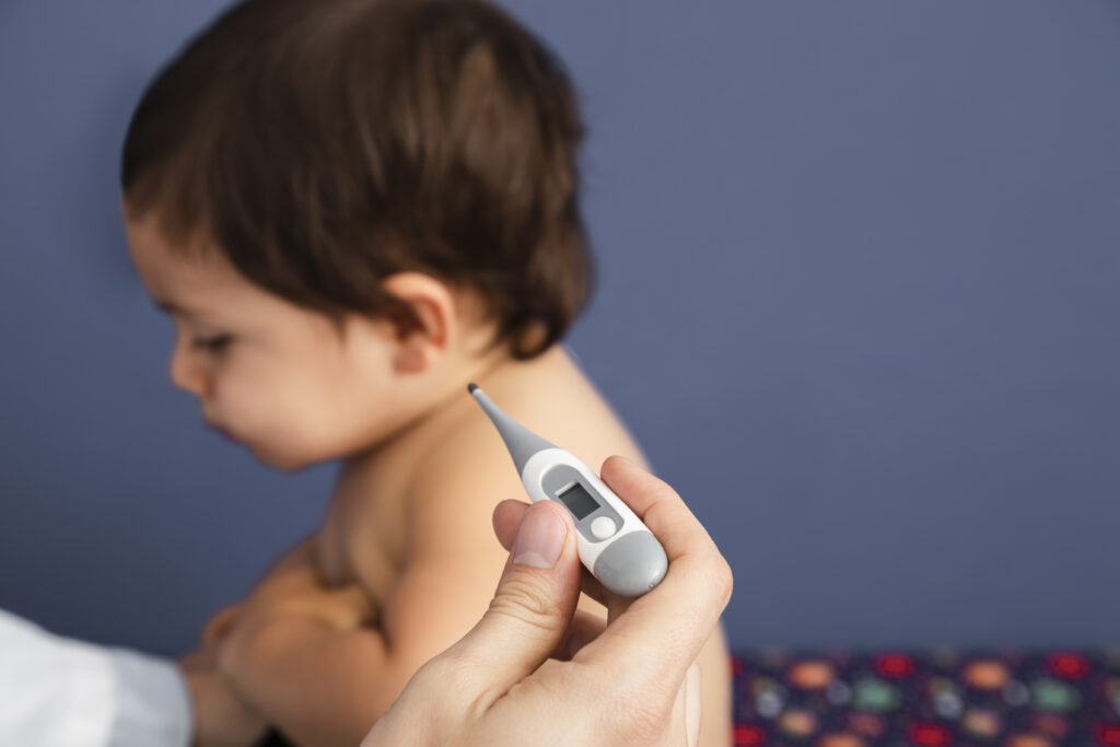 close-up-doctor-checking-baby-temperature-1024x683.jpg